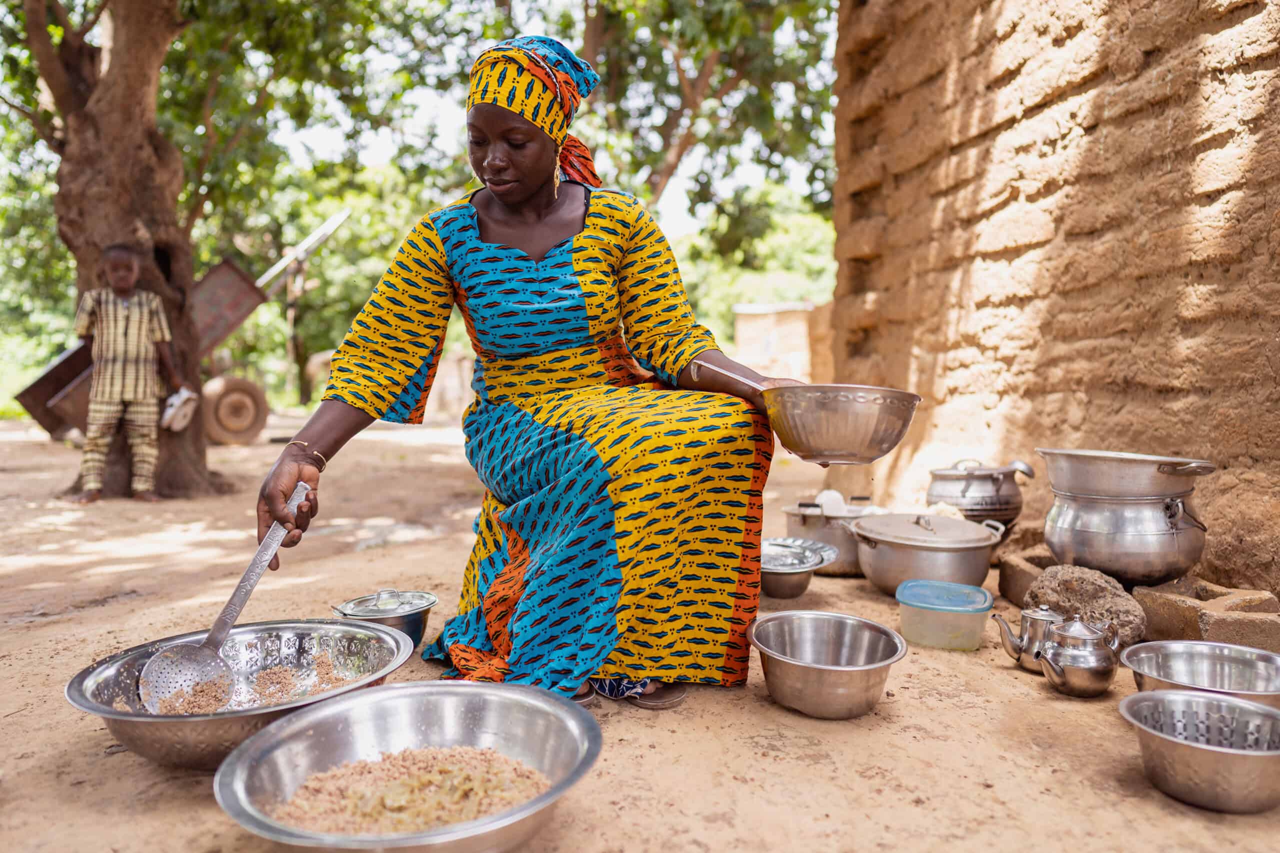 African housewife preparing a meal